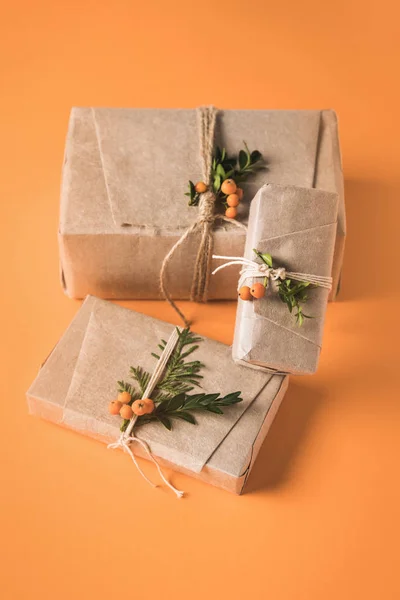 Christmas gifts in craft paper — Stock Photo