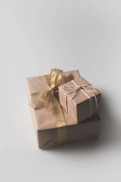 Christmas presents in craft paper — Stock Photo