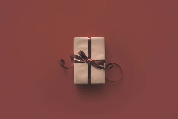 Christmas present with ribbon — Stock Photo