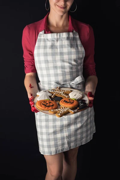 Girl with halloween cookies — Stock Photo