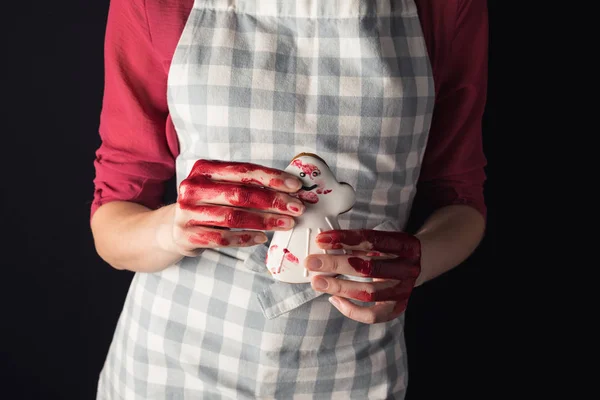 Chica con la galleta de Halloween - foto de stock