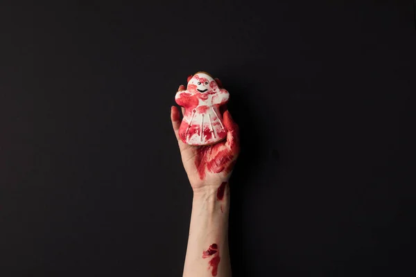 Hand hält Halloween-Plätzchen — Stockfoto