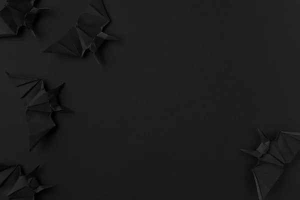 Black origami halloween bats — Stock Photo