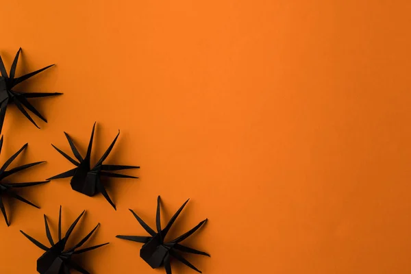 Black origami spiders — Stock Photo