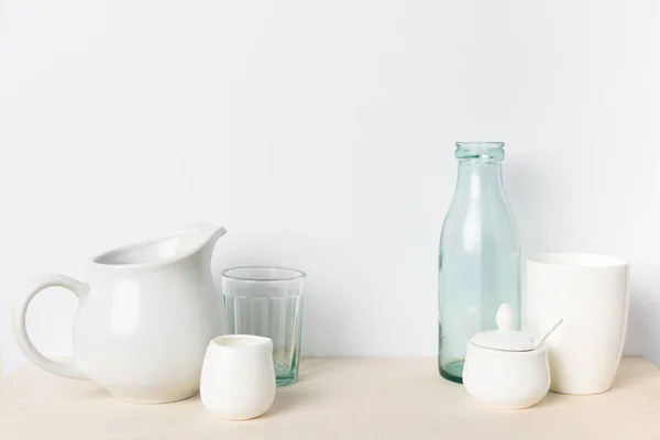 Empty glass and ceramic utensils — Stock Photo