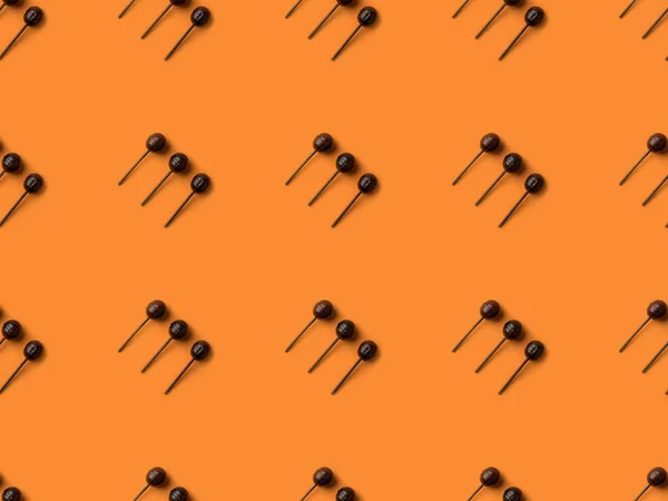 Black halloween lollipops — Stock Photo