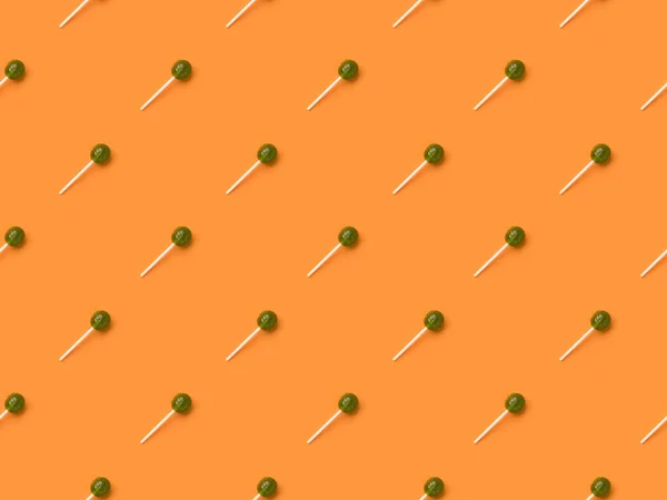 Green halloween lollipops — Stock Photo