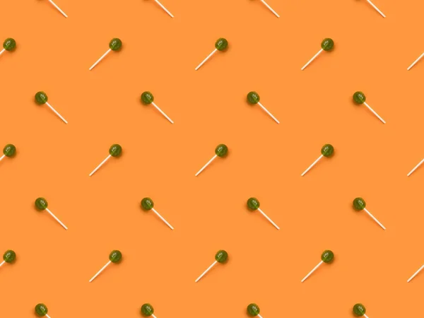 Green halloween lollipops — Stock Photo