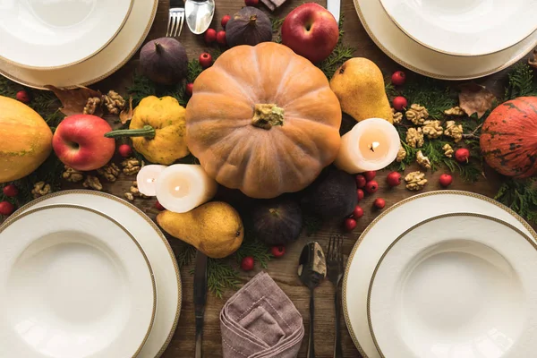 Served table with autumn decor — Stock Photo