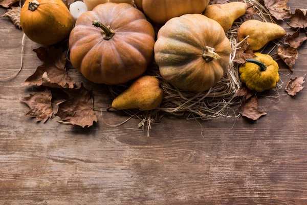 Autumn harvest and leaves — Stock Photo