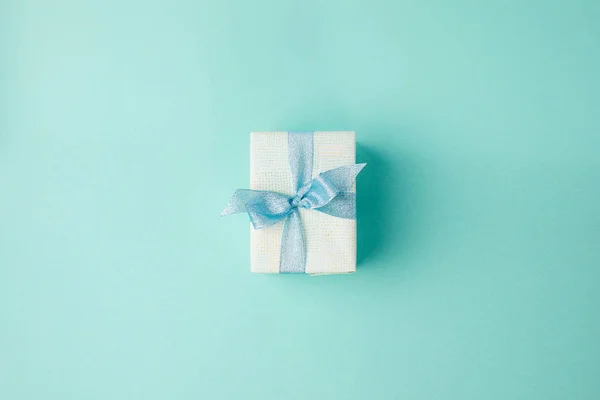 Christmas gift with ribbon — Stock Photo