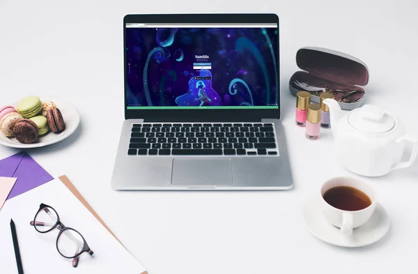 Laptop with tumblr website at workplace — Stock Photo