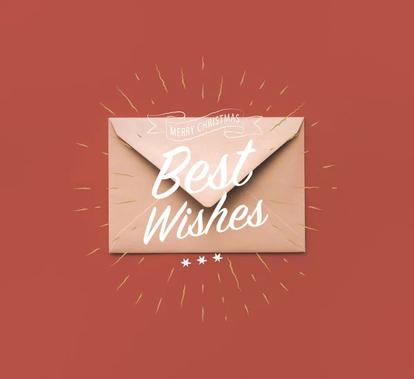 Christmas kraft envelope with greeting — Stock Photo