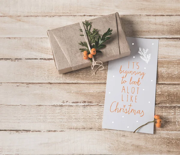 Christmas card and present — Stock Photo