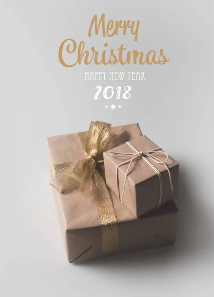 Christmas presents in craft paper — Stock Photo