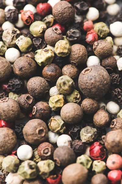 Various spicy peppercorns — Stock Photo