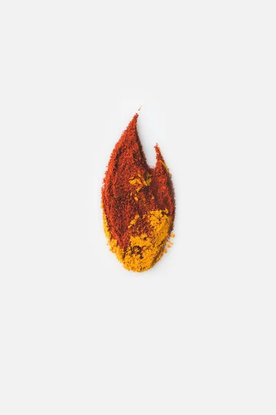 Pimentón y curry en forma de fuego - foto de stock