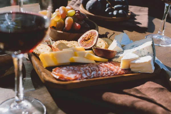 Different snacks for red wine — Stock Photo