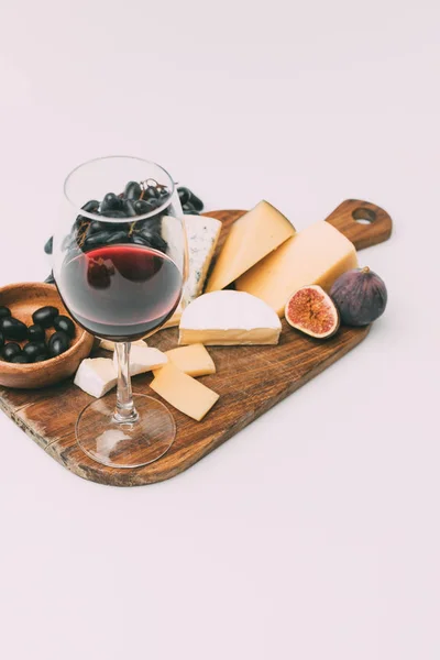 Wine and various snacks — Stock Photo