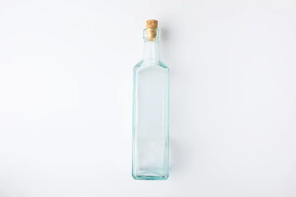 Transparent glass bottle with plug — Stock Photo