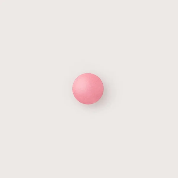 Uma pílula rosa — Fotografia de Stock