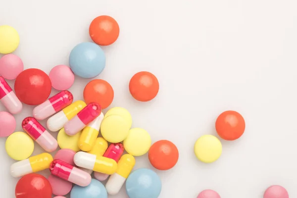 Scattered colored pills — Stock Photo