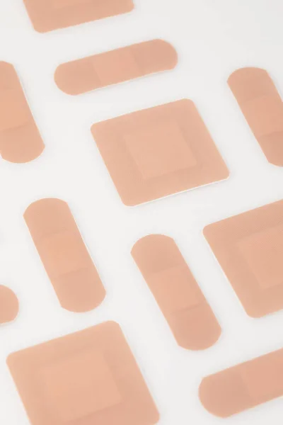 Set of beige plasters — Stock Photo