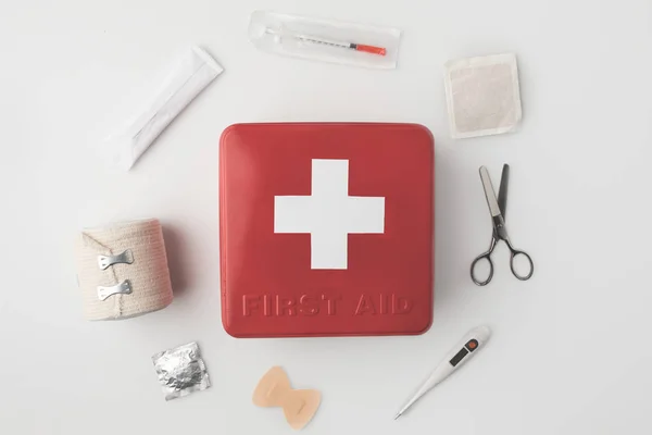 First-aid kit with medical supplies — Stock Photo