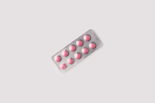 Blister pack with pink pills — Stock Photo