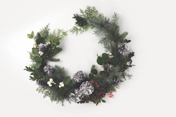 Christmas wreath with fir branches and mistletoe — Stock Photo