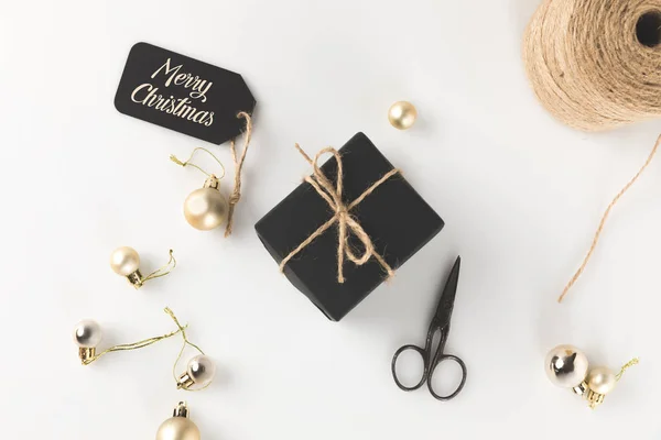 Christmas present and tag — Stock Photo