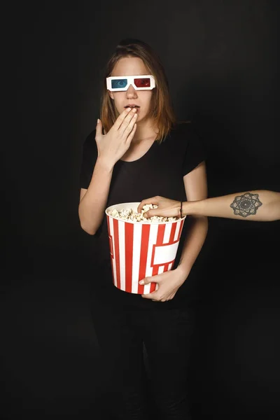 Shocked woman in cinema — Stock Photo