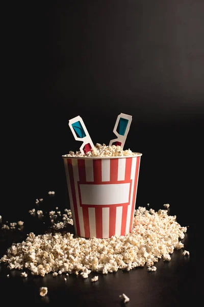 Box of popcorn with 3d glasses — Stock Photo