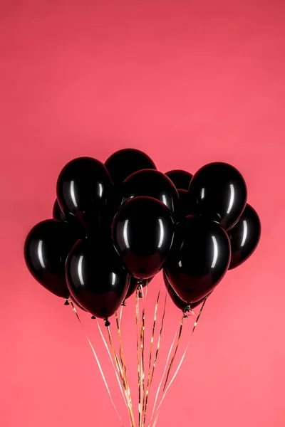 Paquete de globos negros - foto de stock