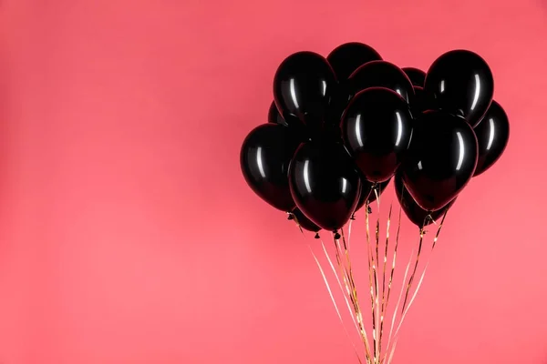 Schwarze glänzende Luftballons — Stockfoto