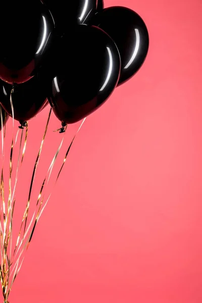Schwarze glänzende Luftballons — Stockfoto