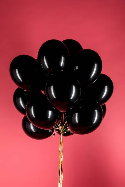 Schwarze glänzende Luftballons — Stockfoto