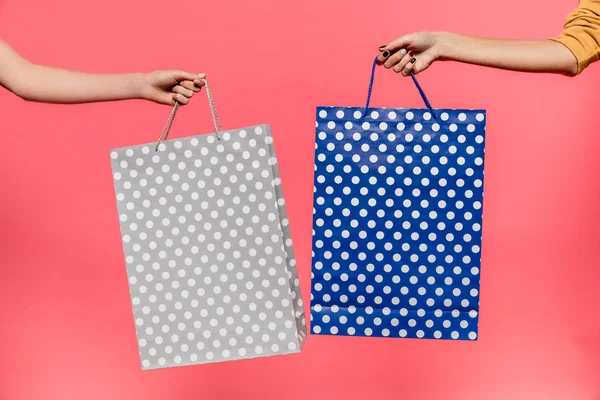 Shopping bags in hands — Stock Photo