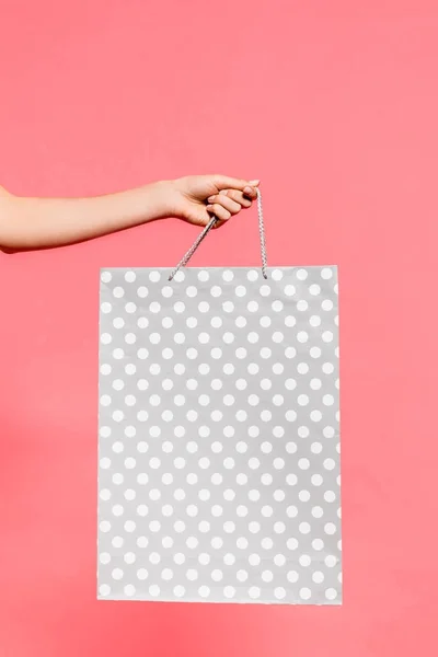 Person holding shopping bag — Stock Photo