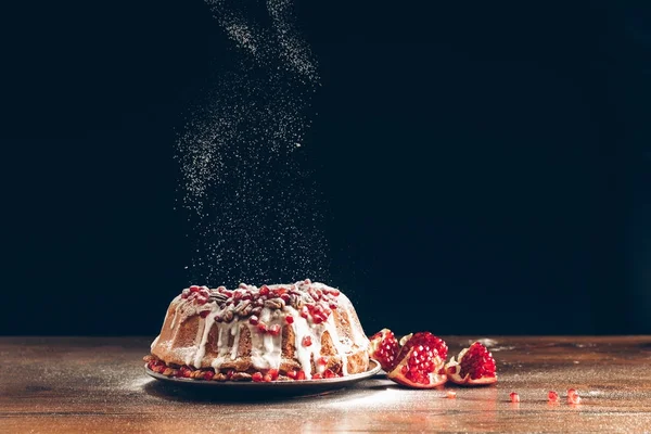 Christmas cake with pomegranate — Stock Photo
