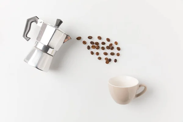 Coffee beans pouring from pot — Stock Photo