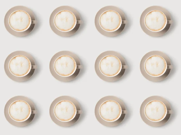 Pattern of cups with latte — Stock Photo