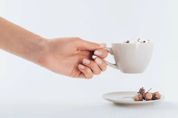 Hand holding cup of cacao — Stock Photo