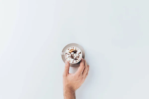 Hand with cup of cacao — Stock Photo