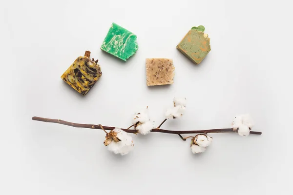 Natural soap with cotton branch — Stock Photo