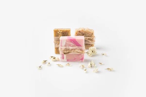 Handcrafted soap tied with threads — Stock Photo