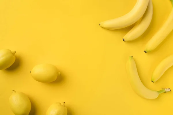 Bananas and lemons — Stock Photo