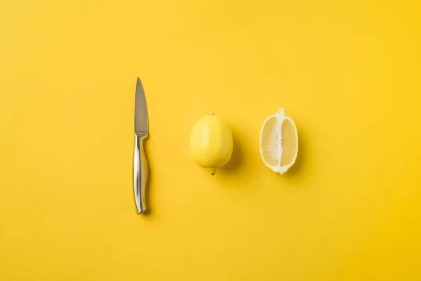 Knife and lemons — Stock Photo