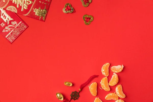 Chinese decorations and tangerines — Stock Photo