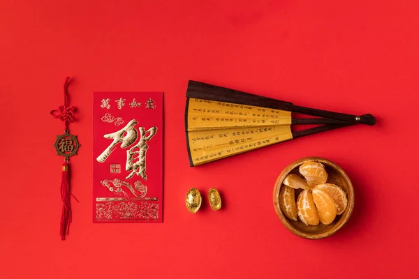 Китайські прикраси і мандарини — стокове фото
